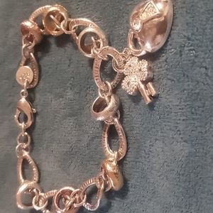 Sterling silver heart & key bracelet with gold vermeil accents circle link.